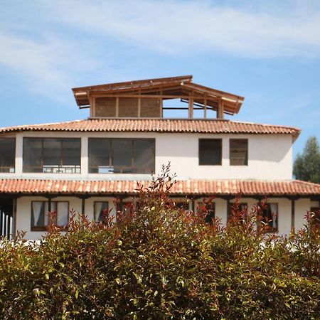 Hotel Tota Eliseo Playa Blanca Lago De Тота Екстериор снимка