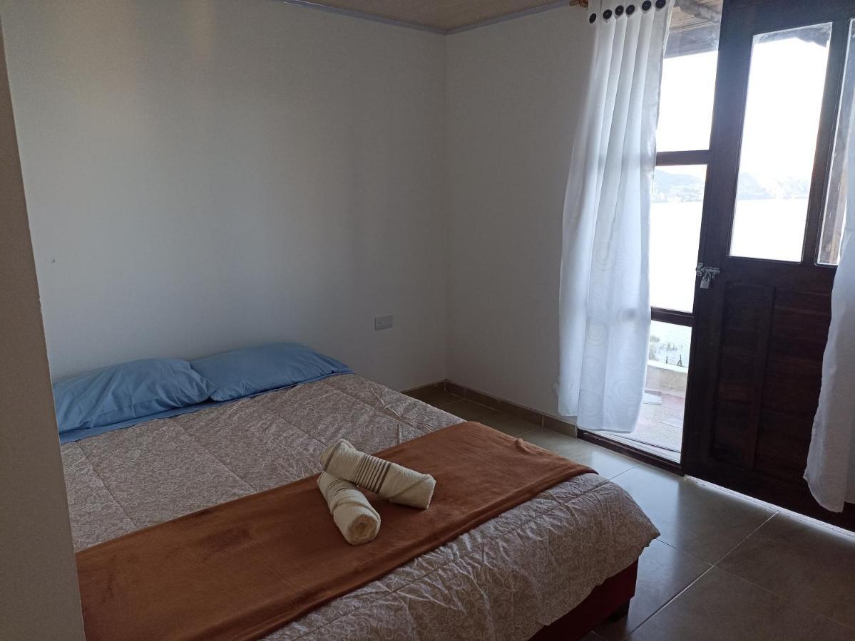 Hotel Tota Eliseo Playa Blanca Lago De Тота Екстериор снимка