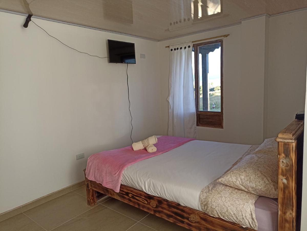 Hotel Tota Eliseo Playa Blanca Lago De Тота Екстериор снимка
