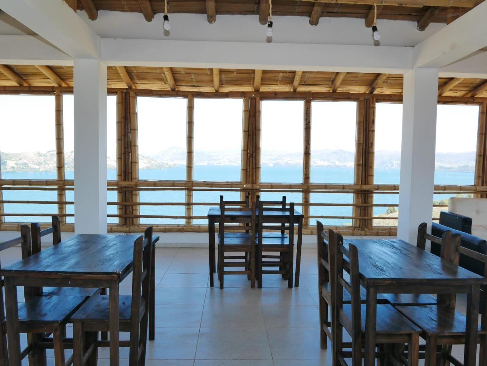 Hotel Tota Eliseo Playa Blanca Lago De Тота Екстериор снимка