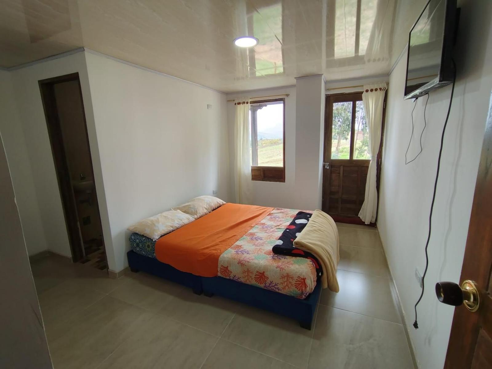 Hotel Tota Eliseo Playa Blanca Lago De Тота Екстериор снимка