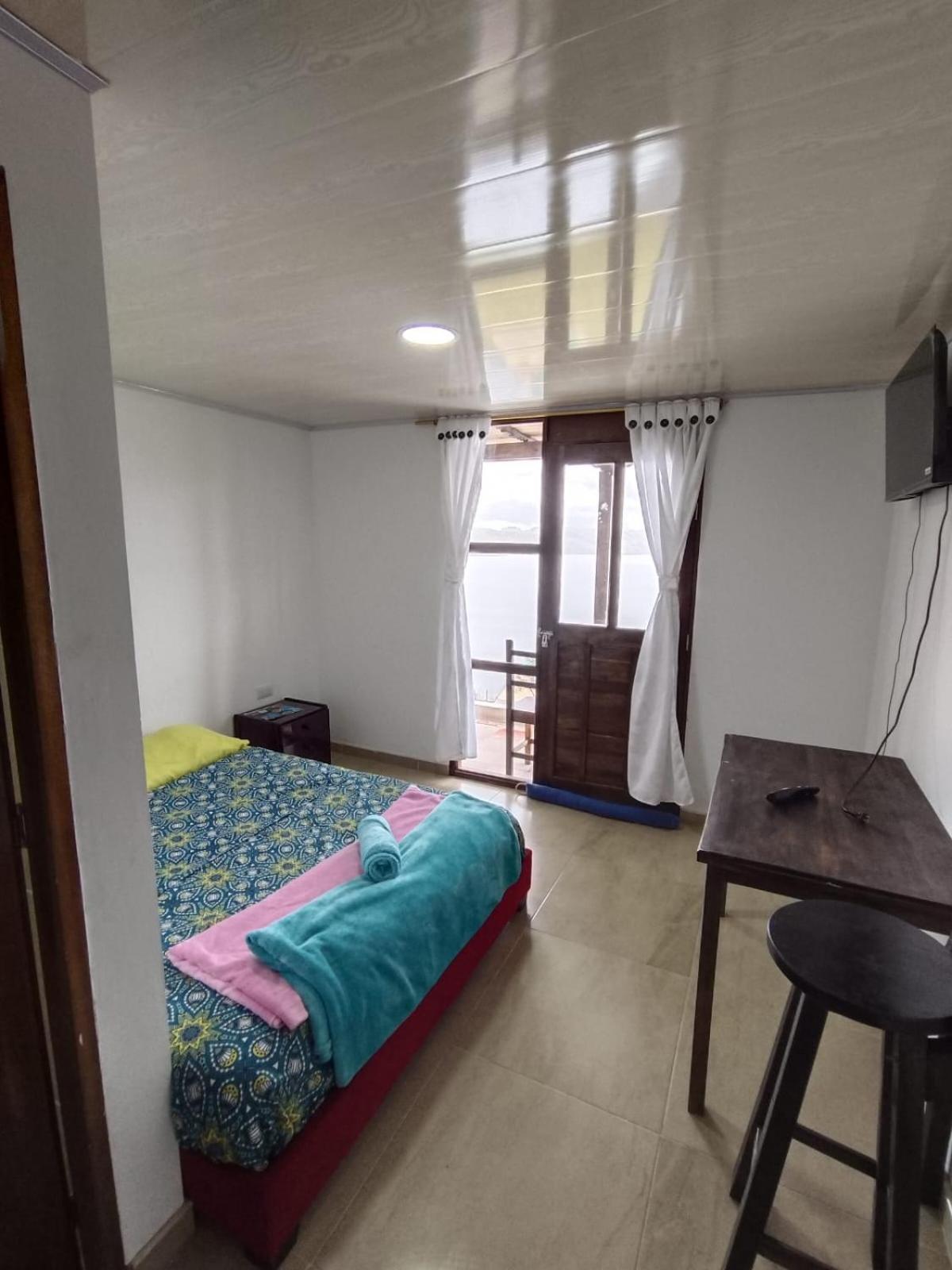 Hotel Tota Eliseo Playa Blanca Lago De Тота Екстериор снимка