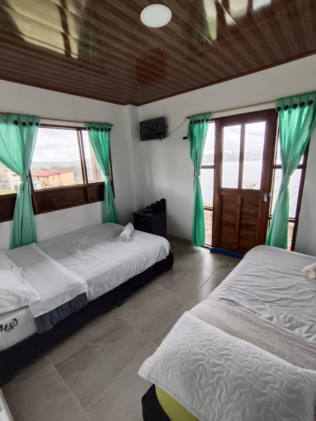 Hotel Tota Eliseo Playa Blanca Lago De Тота Екстериор снимка