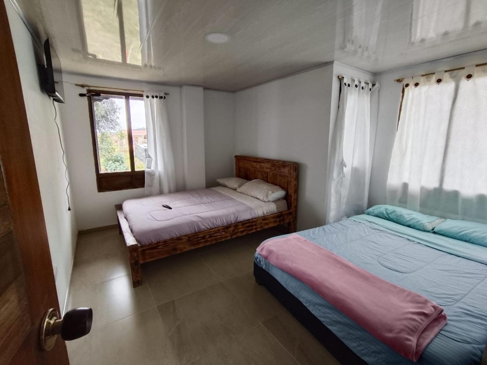 Hotel Tota Eliseo Playa Blanca Lago De Тота Екстериор снимка